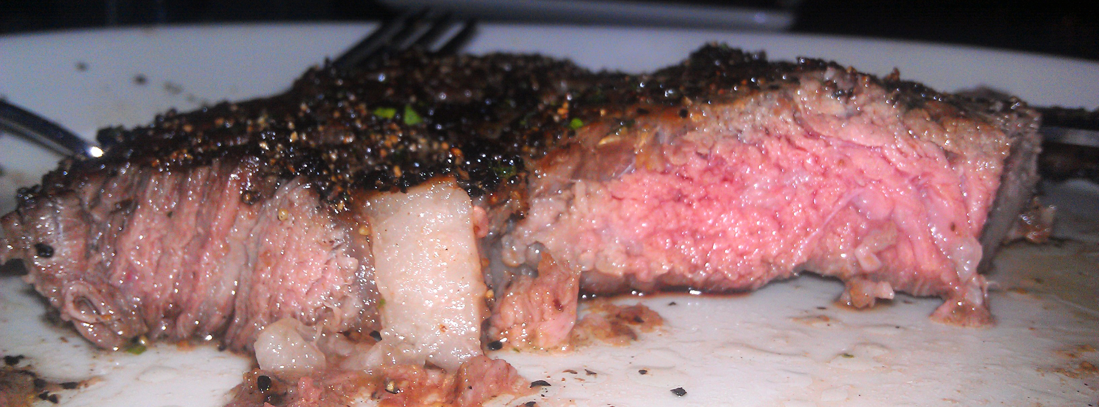 cross section of a rib eye: left side is the fat cap, right side is the "roast" side, as I like to call it.