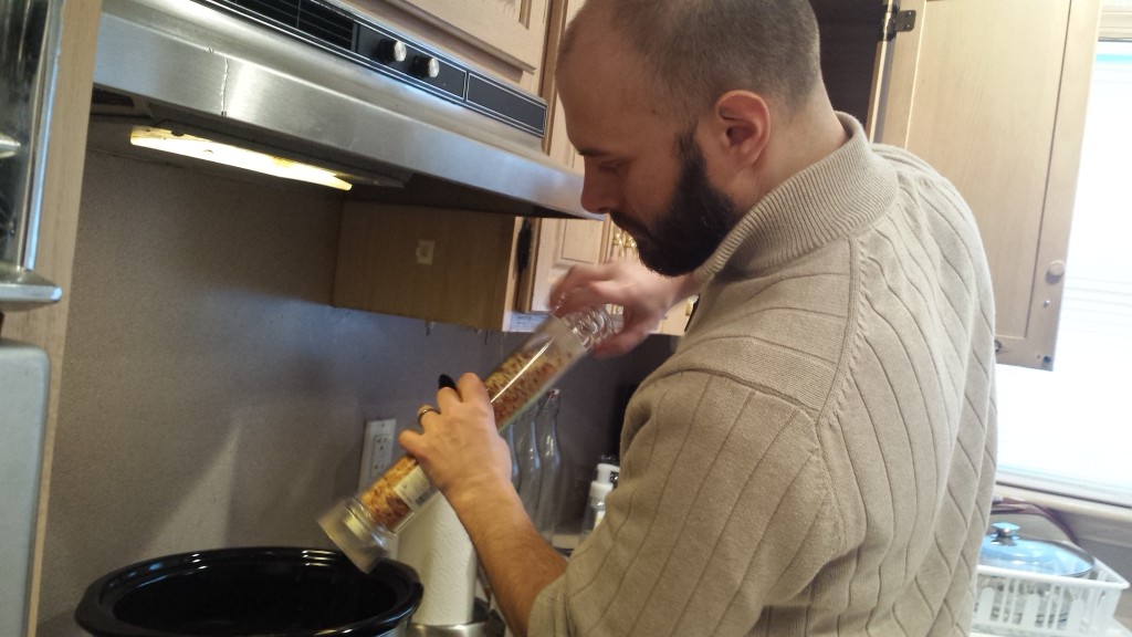 Me, magic-wanding in a mix of kosher salt and crushed red pepper